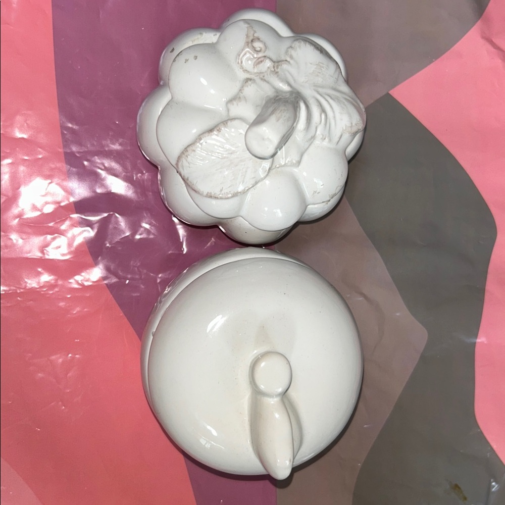 White Ceramic candle Container. One apple & one pumpkin.